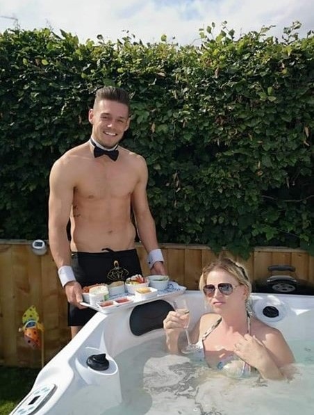 Butlers in the buff hot tub party