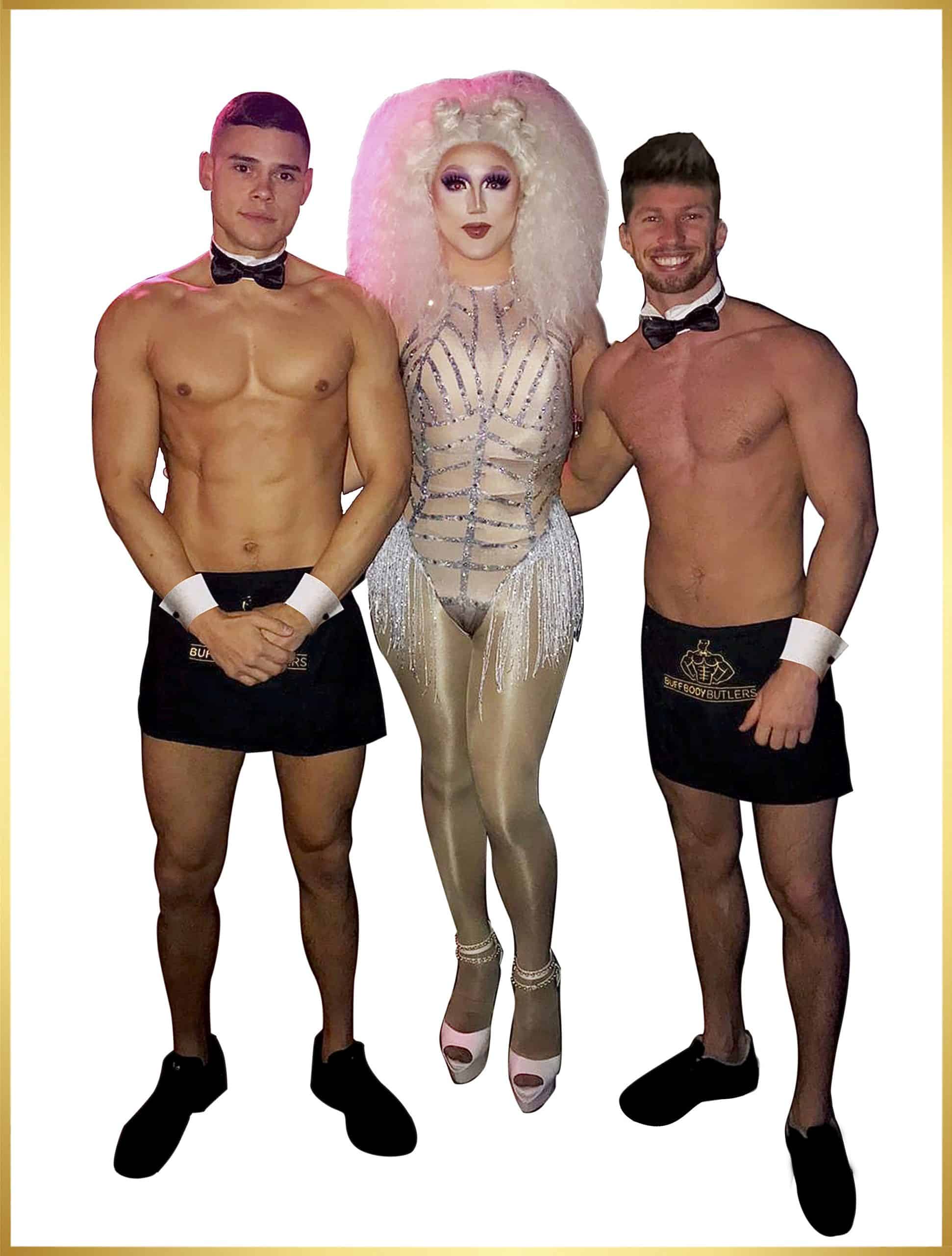 Butlers in the buff with drag queen